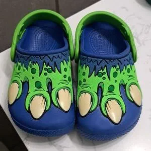 Dinosaur shop feet crocs